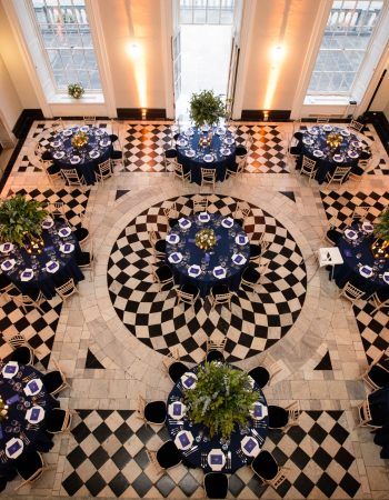 Queen's House - Great Hall set up with dinner round tables